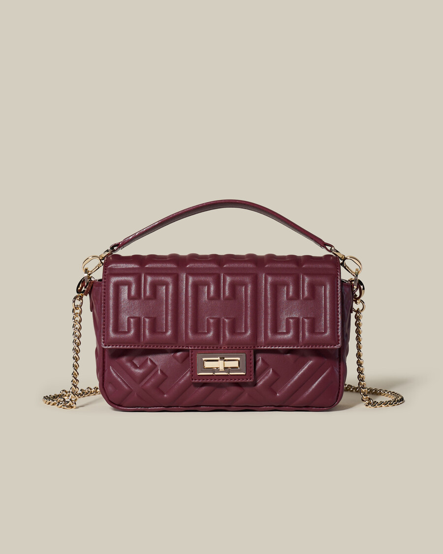 bolso de piel repujada