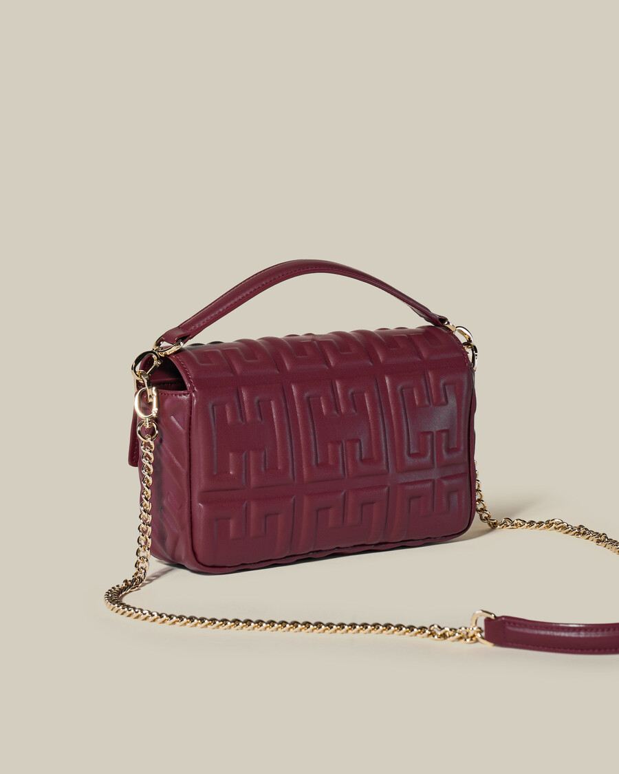 bolso de piel repujada